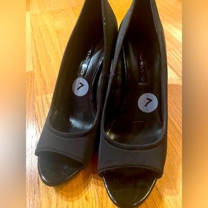 Bandolino wedge heel shoes.